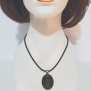 Lia Sophia Realm glass tiger eye oval gold tone pendant cord necklace